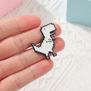 White pixel dinosaur enamel pin brooch in retro game style for clothing and lapels