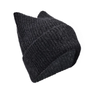 Close-up of black chunky knit cat ear beanie with thick ribbed texture and warm cuff