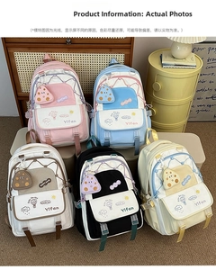 Detailed arrangement of colorful school backpacks in pink, blue, white, black, and yellow