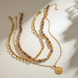 Multi-layer gold paperclip chain and natural stone beaded necklace with angel pendant