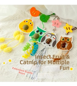 Detail of felt cat toys with catnip balls, silvervine, feathers and elastic cords