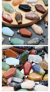 Detailed macro view of coffin-shaped crystal pendants in tiger eye and rose quartz styles