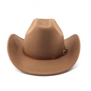 Detail of brown felt western cowboy hat with a leather strap and gold metal buckle