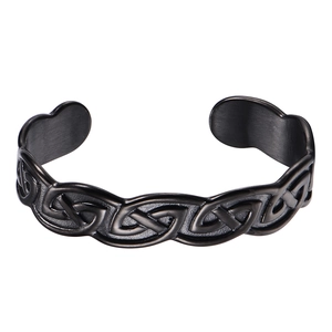 Detailed view of matte black Viking Celtic knot vintage stainless steel cuff bracelet