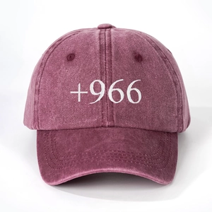 Vintage washed burgundy baseball cap featuring white +966 embroidery with adjustable strap
