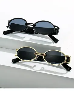 Retro oval sunglasses with double bridge structure in black and gold metallic frames
