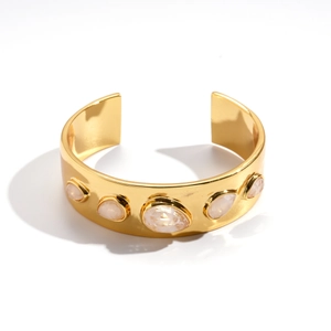 Bracelet manchette vintage plaqué or avec cinq pierres précieuses blanches translucides