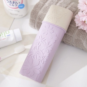 Custodia portatile per spazzolino beige e viola chiaro con rilievo floreale chic