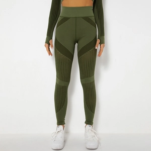 Detail of high-waist seamless yoga leggings with breathable mesh panels in dark olive green