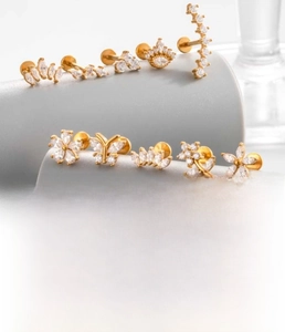 Detailed chart of butterfly and flower labret studs with zircon in gold and silver finish
