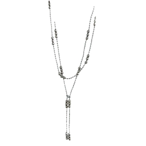 Minimalist silver beaded layered necklace with elegant tassel pendant on white background