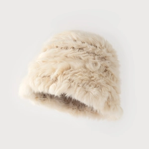 Plush faux rabbit fur bucket hat in beige for winter, featuring a soft warm fuzzy texture