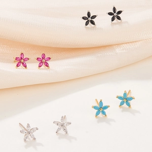 Detailed view of petal-shaped 925 silver stud earrings with colorful cubic zirconia stones