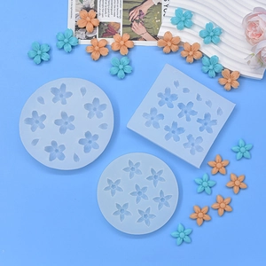 Blue silicone flower molds for DIY fondant and chocolate baking with cherry blossom patterns