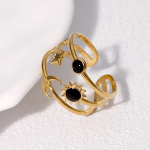 Minimalist adjustable gold open ring with celestial sun moon star motifs and black accents