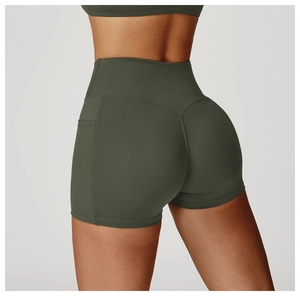 Close-up back view of dark olive green high-waisted yoga shorts with functional side pocket