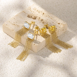 Detail of S925 silver long tassel earrings with marquise diamonds and 18K gold chains