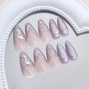Dreamy purple cat eye press-on nails with 3D silver metallic lines in almond shape