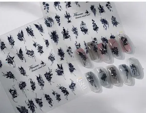 Macro view of 3D butterfly and vintage black floral embossed nail art stickers TL-261