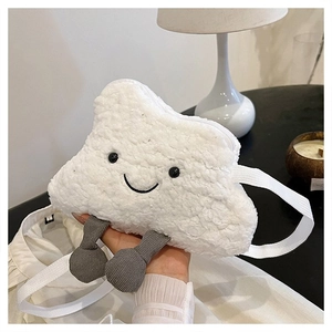 Close-up of cute white cloud plush crossbody bag with smiling face and dangling legs