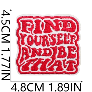 Detailed size view of red and white embroidered patch with Find Yourself And Be That quote