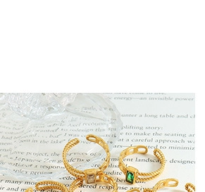 Detail of 18K gold-plated double-layer open rings with rectangular zircon emerald stones