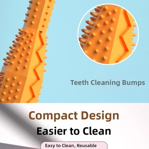 Detail of orange textured pet chew toy showing serrated spikes for dental cleaning