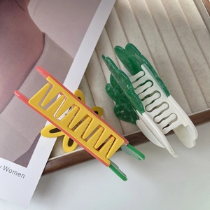 Chic acetate hair claws in pineapple and cabbage shapes for stylish women's hair accessories