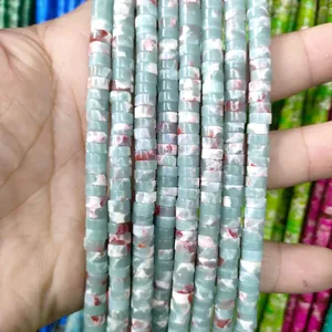 Close-up of 3x6mm green natural stone cylinder spacer beads for DIY jewelry making