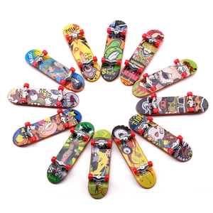 Top view of 12 colorful mini finger skateboards in a circular layout for creative play