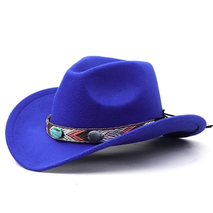 Detail of royal blue felt cowboy hat with ethnic woven band and turquoise stones
