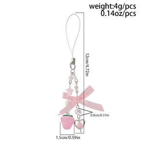 Detail view of pink ribbon bow phone charm with strawberry pendant and dimensions