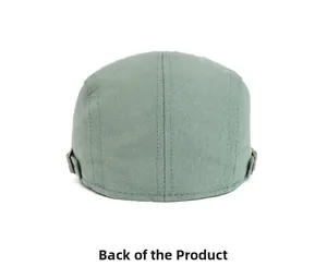 Rear view of light green cotton twill flat cap showing fine stitching and metal buckle