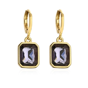 Detailed close-up of 18K gold plated earrings featuring rectangular purple zircon stones