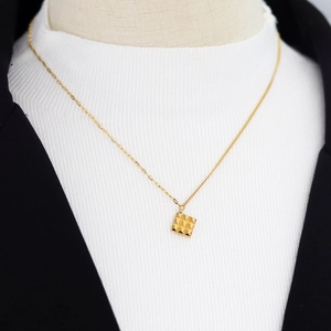 Gold square grid chocolate pendant necklace with asymmetrical chain for women