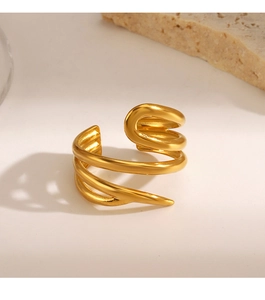 Detail view of gold triple spiral open ring featuring a modern minimalist satin finish