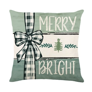 Forest green Christmas pillow cover with Merry and Bright lettering and plaid bow