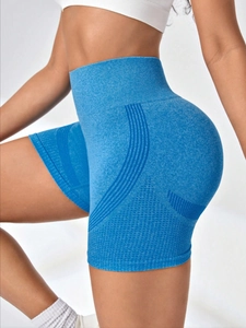 Close-up of sky blue high-waisted seamless yoga shorts featuring geometric knit texture