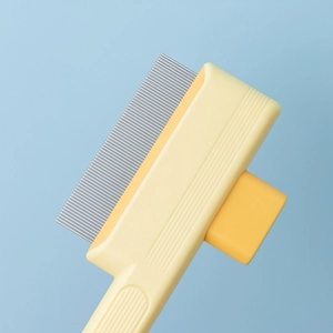 Self-cleaning pet brush for cats and dogs with dense metal teeth and ergonomic handle