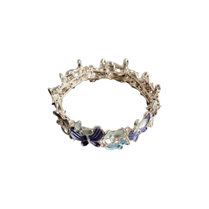 Elegant silver butterfly bracelet featuring gradient blue and green enamel charms