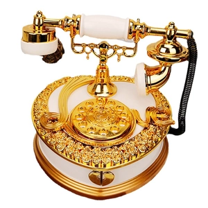 Vintage classical rotary telephone music box in elegant gold and white ceramic finish