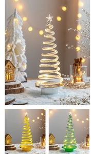 Macro view of spiral LED Christmas tree lights in warm white, yellow, and green colors