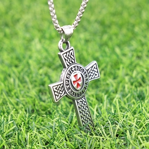 Vintage stainless steel Maltese cross pendant with red enamel on a silver chain
