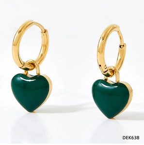 Macro shot of forest green enamel heart charm earrings with golden hoops and hinges