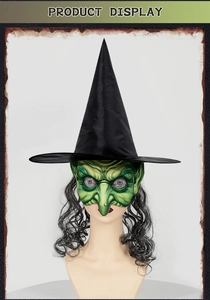 Detailed close-up of green witch mask with pointed hat and silver-gray curls for Halloween