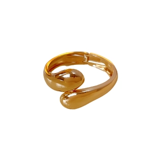 Minimalist gold teardrop open bangle with high-polished metal finish for women
