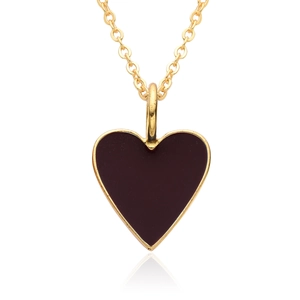 Detail shot of heart pendant necklace in 14K gold plating with deep red enamel finish