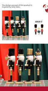 Detail of four piece set black and gold Christmas nutcracker wooden soldiers decorations