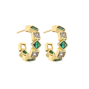 Close-up of 18K gold plated C-hoop earrings with emerald green and white zircon stones
