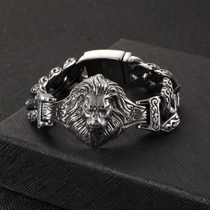 Detailed close-up of retro lion head stainless steel bracelet on a premium gift box